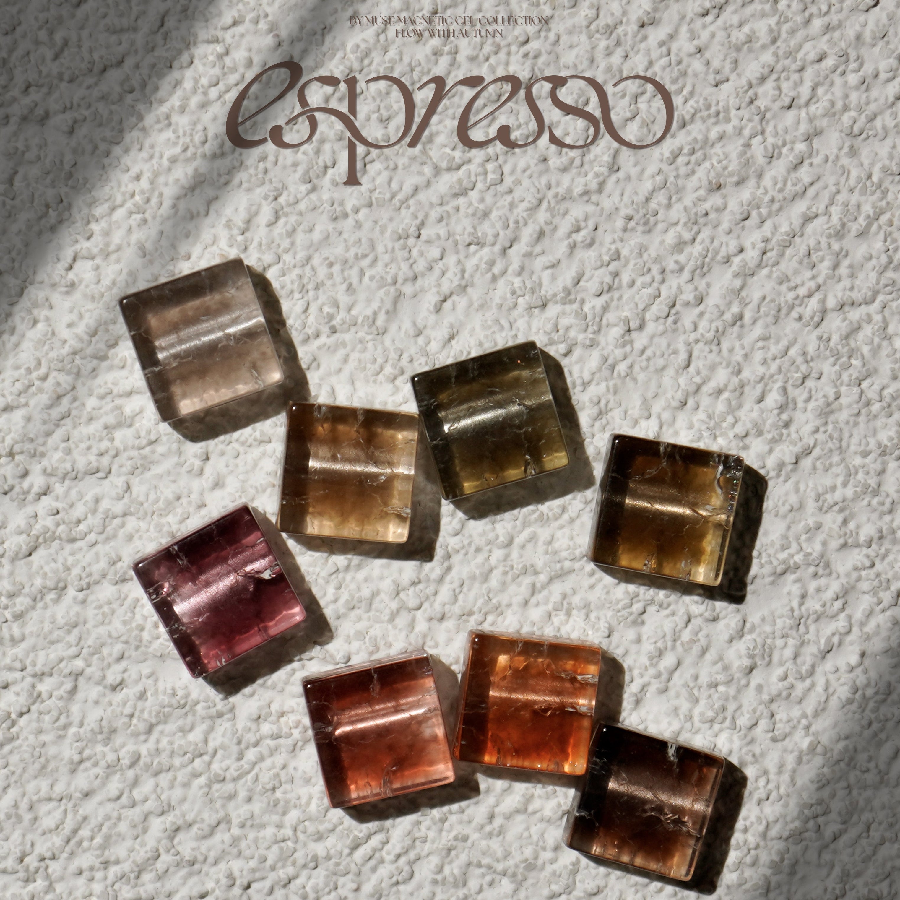 Square-shaped objects on a textured surface with 'espresso' branding.